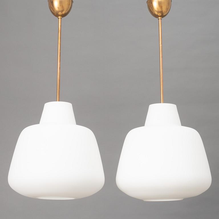 A pair of Swedish Modern ceiling lamps, mid 20th century.