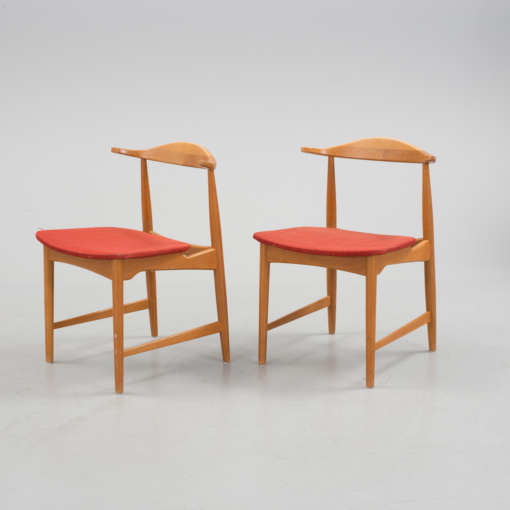 A pair of "Danske" chairs by IKEA.
