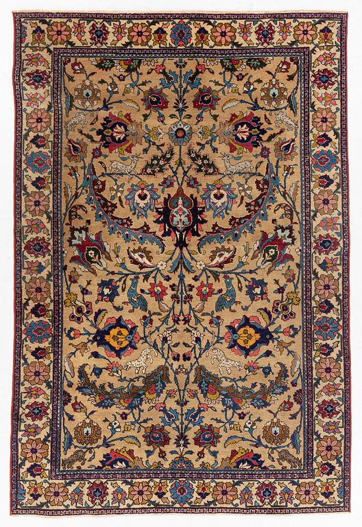 A semi-antique Tabriz of  'Sickle-Leaf' design, c 240 x 161 cm.