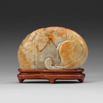 264. A carved nephrite figurine, late Ming dynasty (1368-1643).