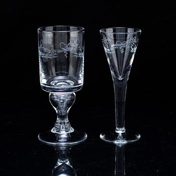 A set of 12 schnaps glases and 12 white wine glasses "Antik" from Reijmyre Glasbruk, Sweden.