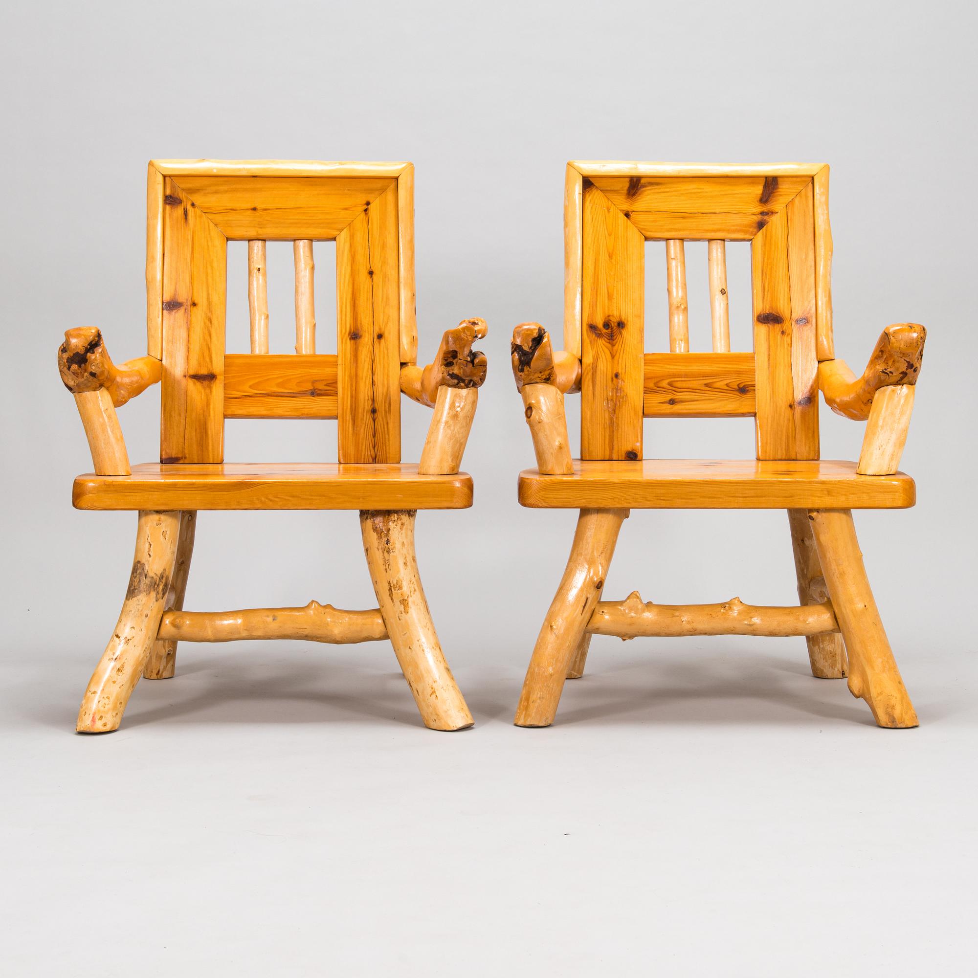 A pair of mid-20th-century armchairs made by Tauno Saarela Kuusamo Finland.