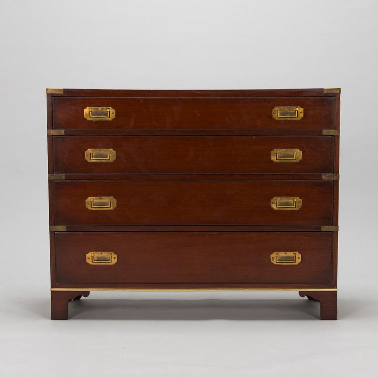 A chest of drawers, England, second half of the 20th century.
