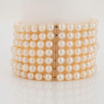 A seven strand cultured pearl Mikimoto bracelet.