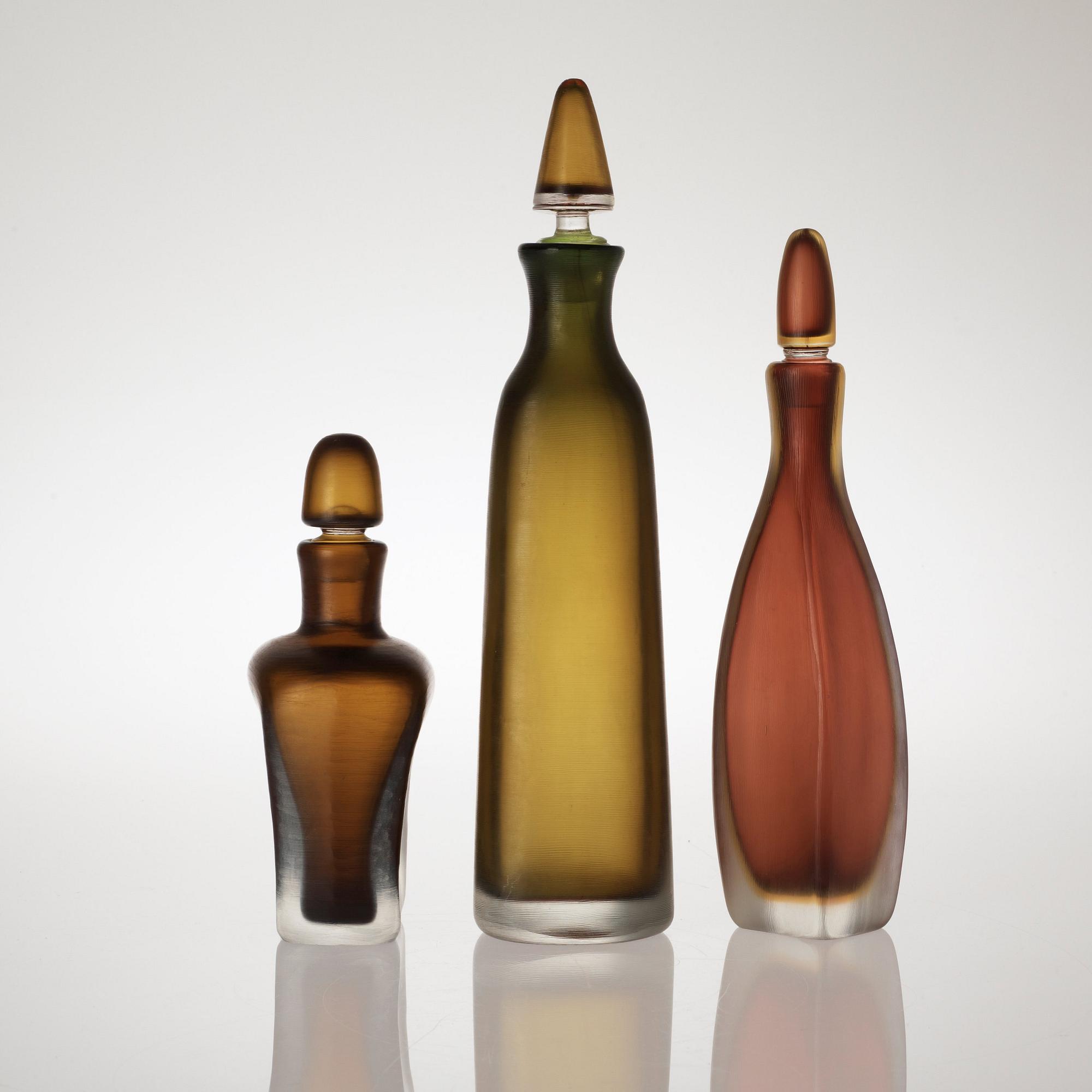 Three Paolo Venini 'Inciso' bottles, Venini, Murano, Italy, 1950's.
