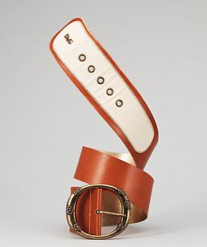 1448. A brown leather belt by Dolce & Gabbana.