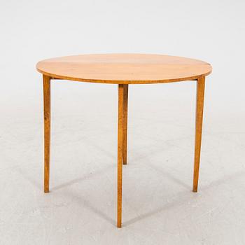 A birch folding table later part of the 19th century.
