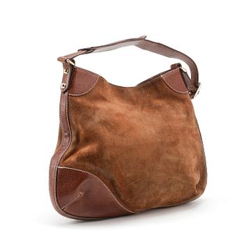 GUCCI, a brown suede shoulder bag.