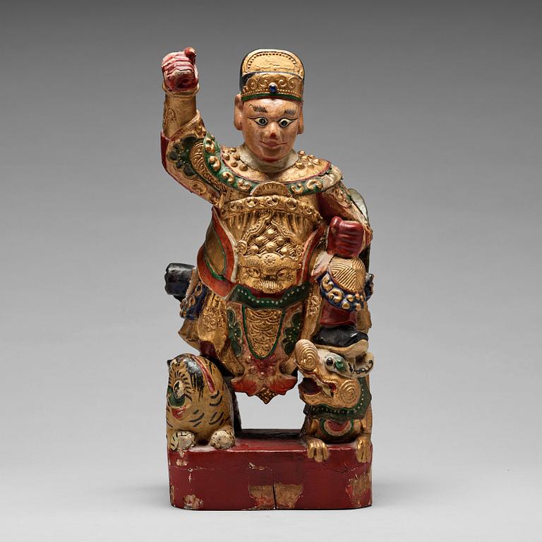A lacquered wooden figure, Qing dynasty, 19th century.