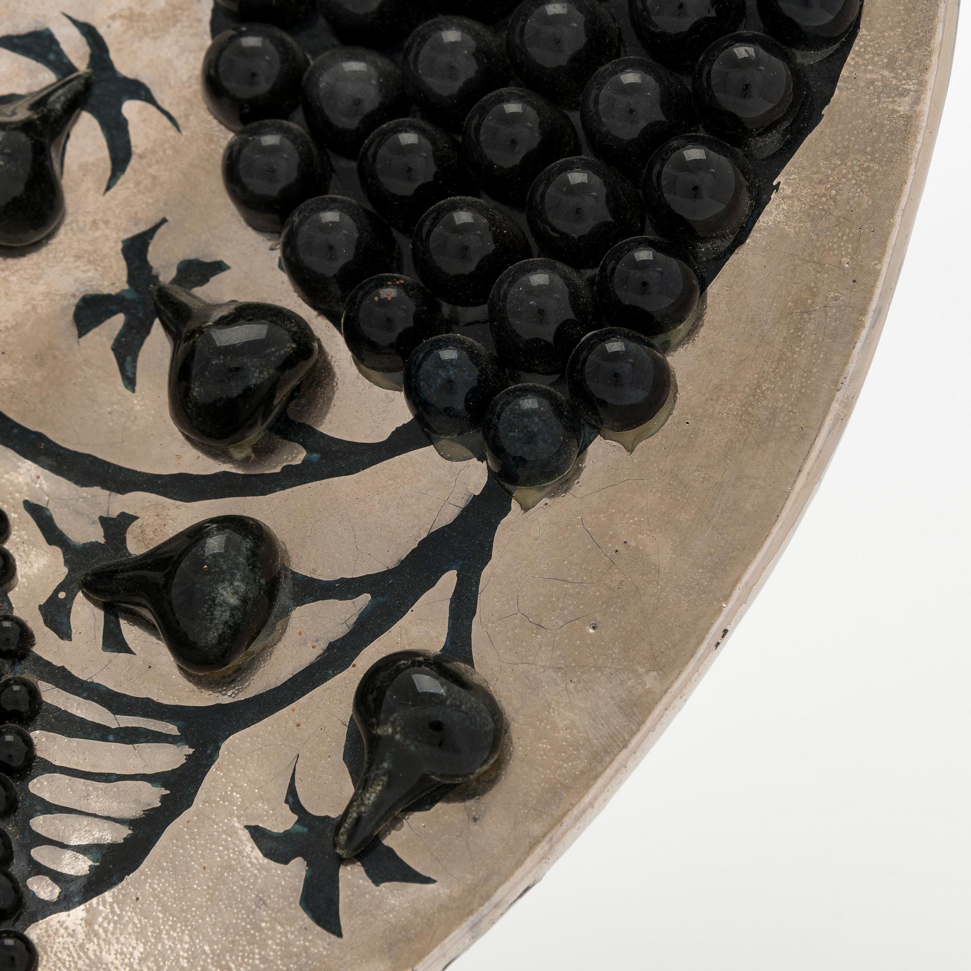 Birger Kaipiainen, a stoneware decorative dish signed Kaipiainen Arabia.