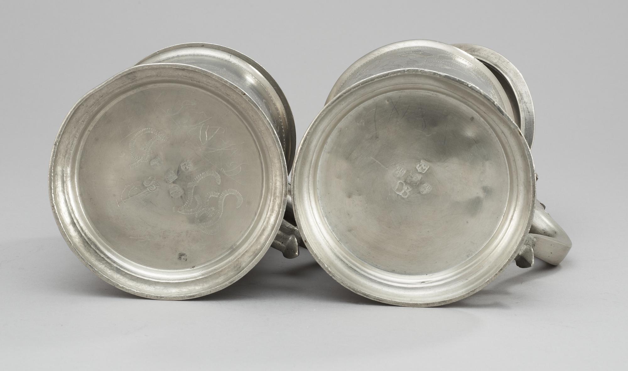 A set of two pewter pints. Makers mark by Gottlob F Bauman, Hudiksvall (1789-1826/31).
