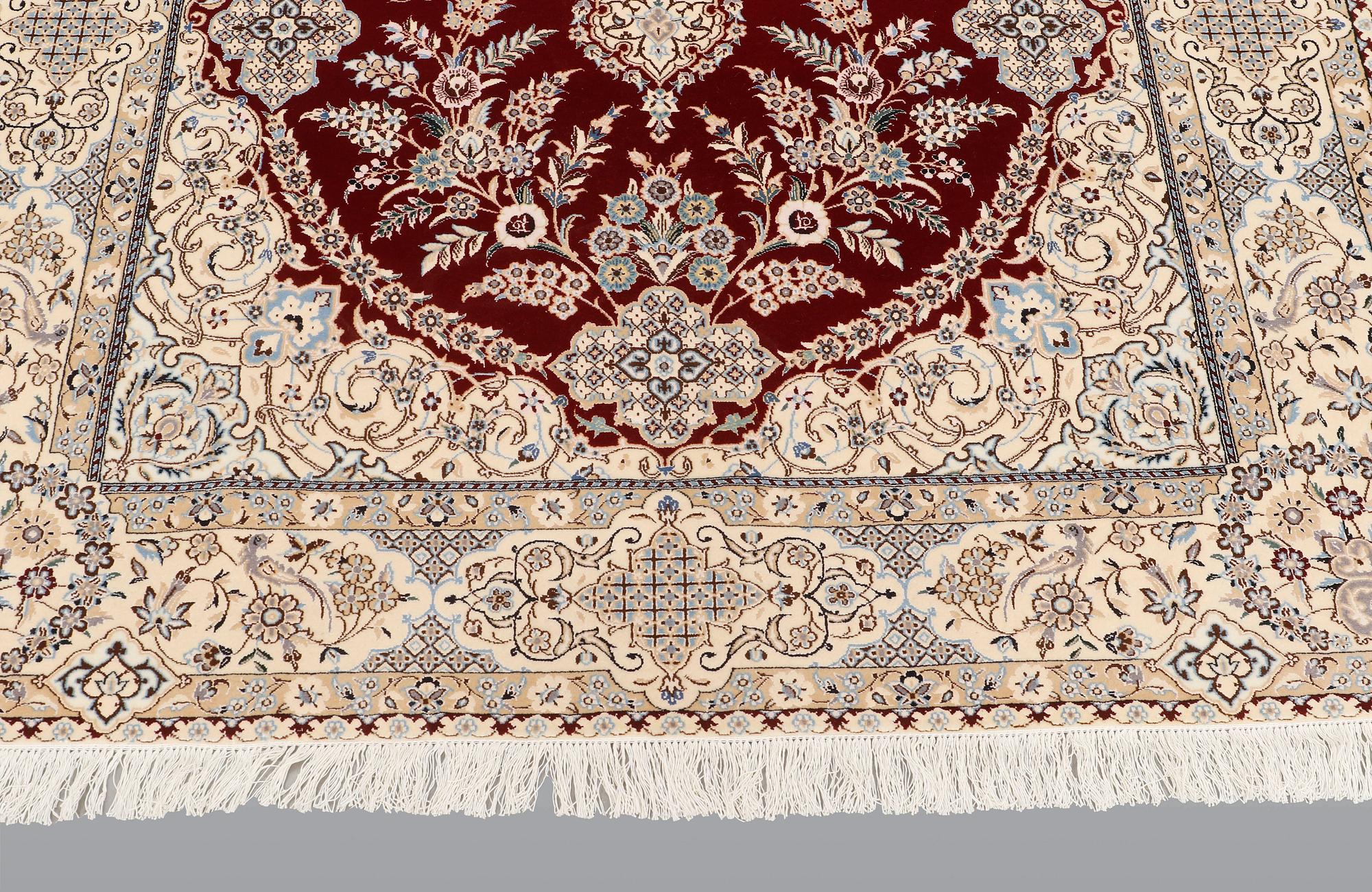 A carpet, Nain part silk s.k 6LAA, 239 x 155 cm.