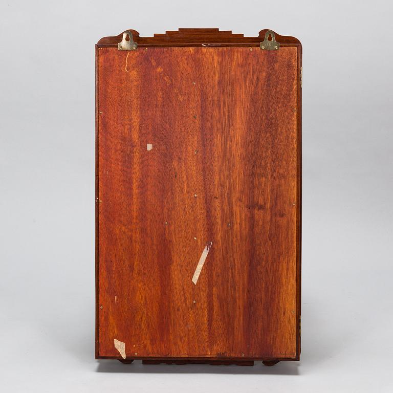 A Chinese 20th century hardwood wall cabinet.