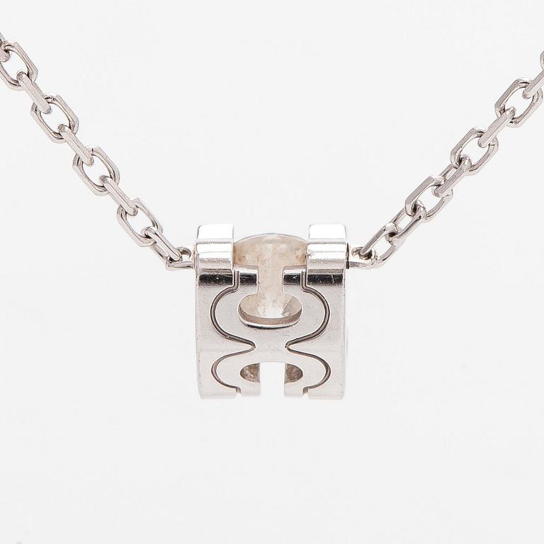 Cartier, an 18K white gold 'C de Cartier' necklace with a brilliant-cut diamond.