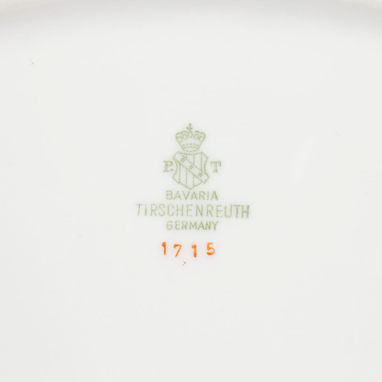 A 60-piece tableware set, Tirschenreuth Bavaria, Germany and nine mocha cups with saucers from Limoges, France, mid.