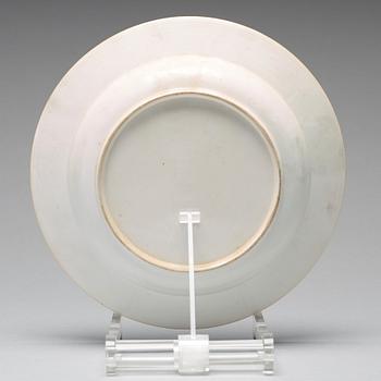 A set of eight blue and white armorial soup dishes, Qing dynasty, 18th Century.