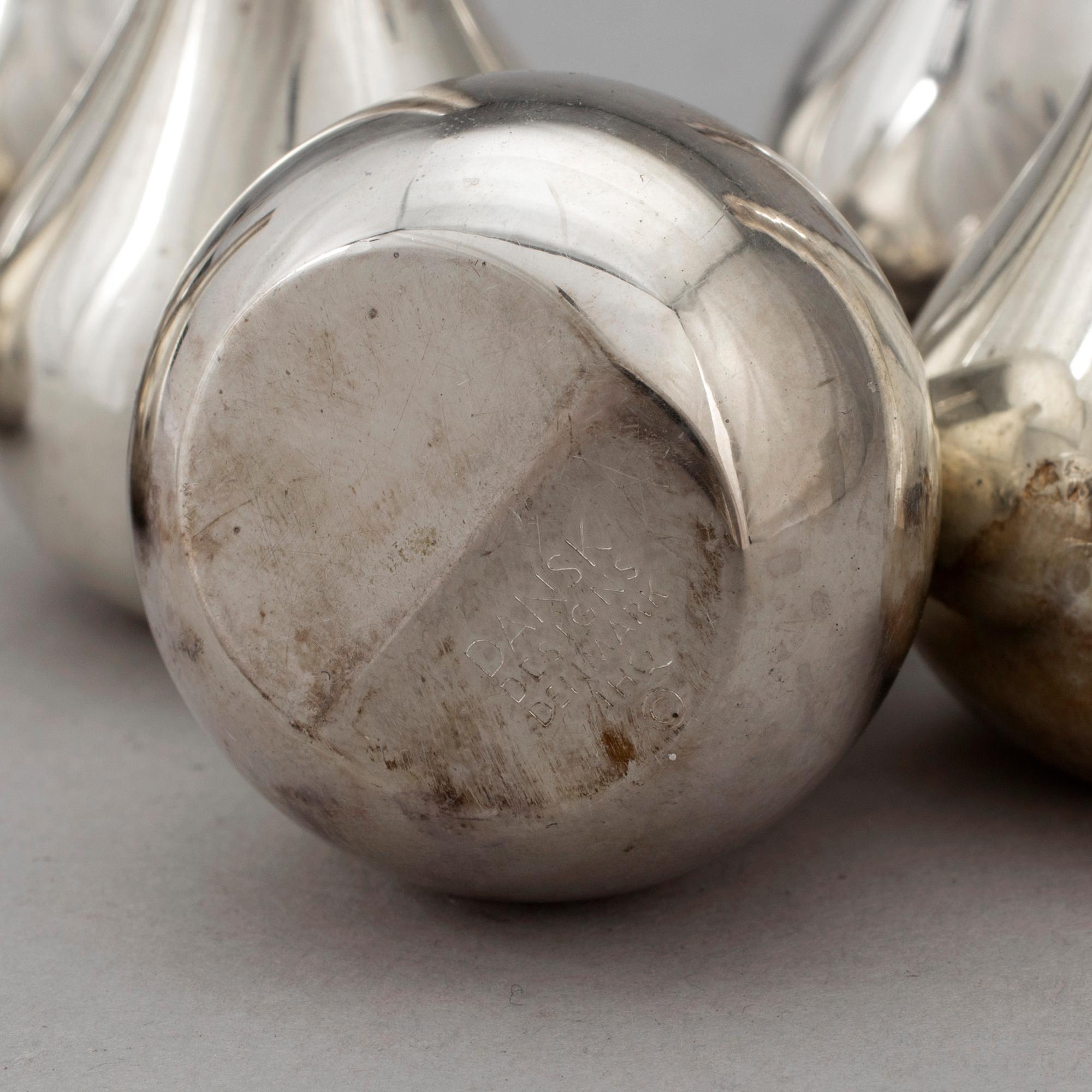 FOUR PAIRS OF PLATE CANDLESTICKS by J H Quistgaard, Dansk Designs, Denmark, 1960's.