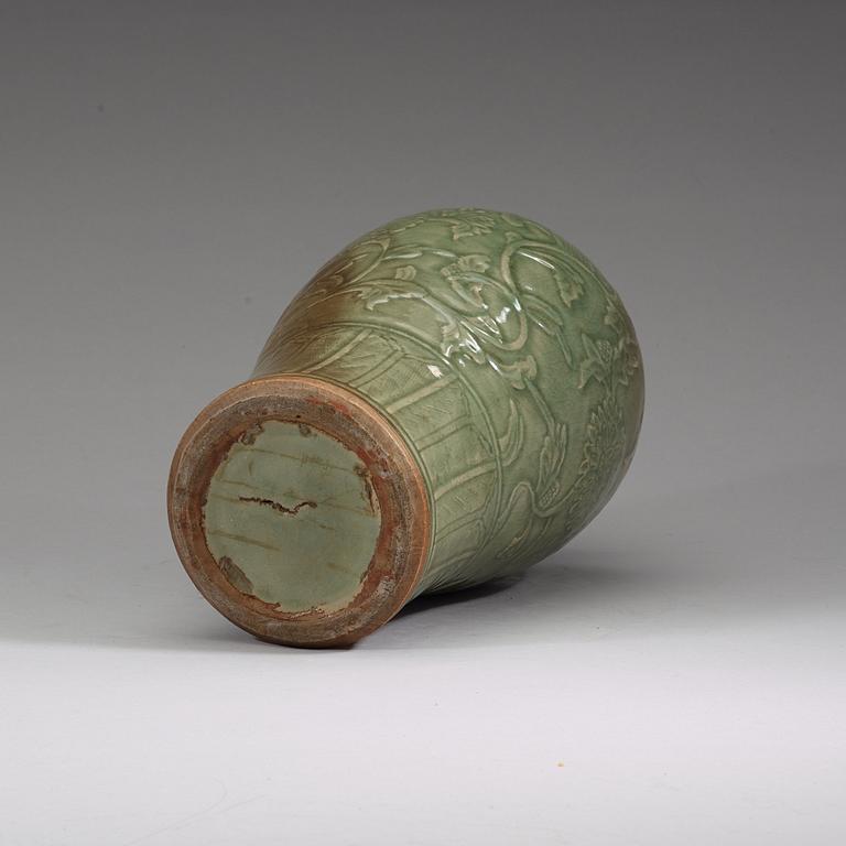 A celadon glazed Meiping vase, presumably Ming dynasty.