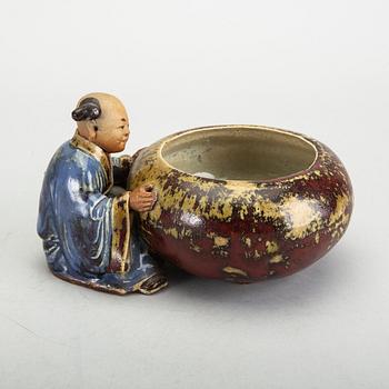 A Japanese 20th century signed porcelain figurine.