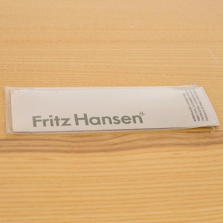 A Poul Kjaerholm "PK-55" table from Fritz Hansen, Denmark.