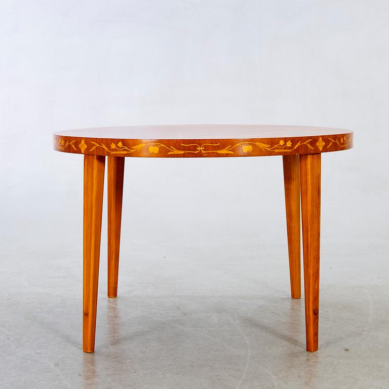 A Swedish modern coffee table bt Kocks Trelleborg 1940's.