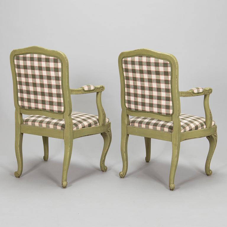 A pair of 20th century  Rococo style armchairs.