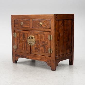 A Chinese hardwood cabinet, 20th century.
