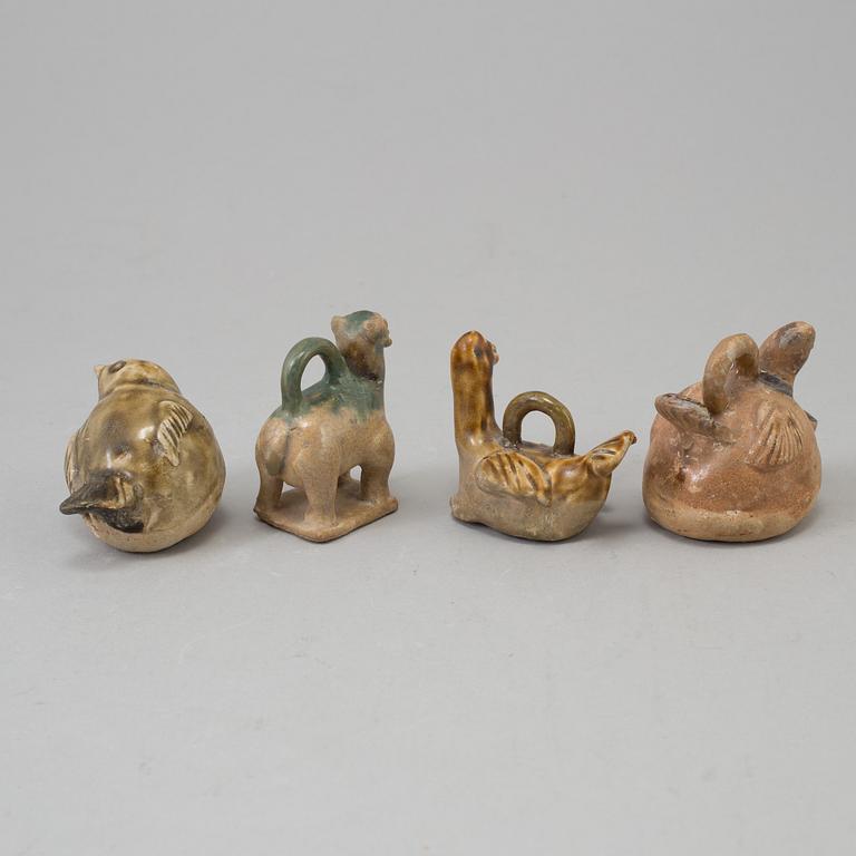 Nine chinese ceramic figures, tang dynasty (618-907).