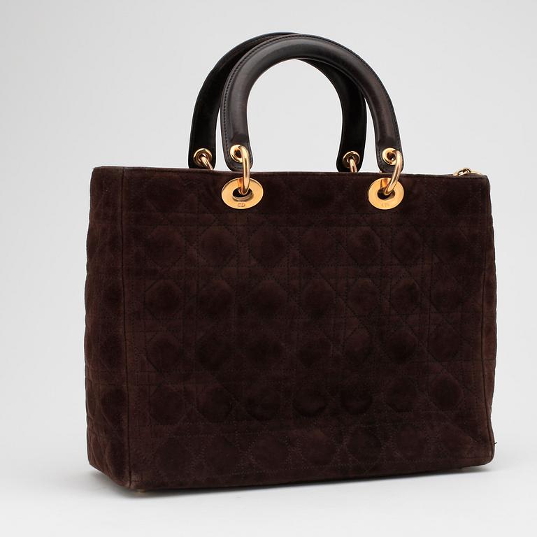 CHRISTIAN DIOR, a brown suede handbag.