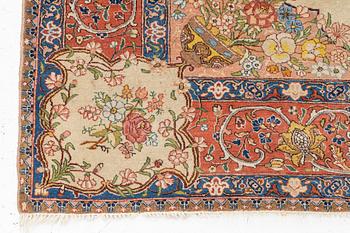 A semi-antique Tabriz carpet, West Persian, c. 250 x 175 cm.