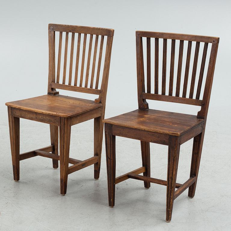 A provincial dining table and eight similar chairs, Sweden, 19th century.