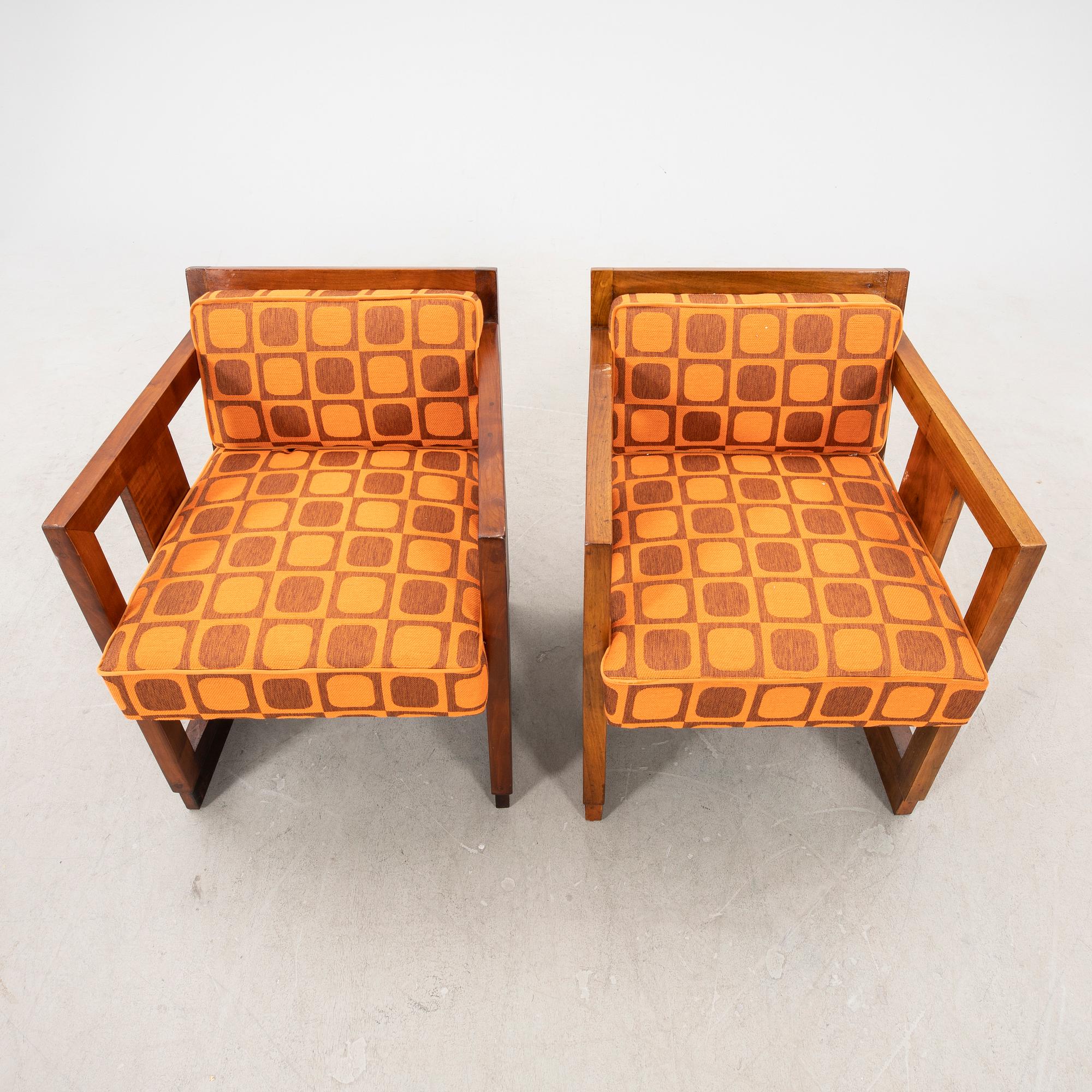 A pair of similar stained wood art déco armchairs from the first half of the 20th century.