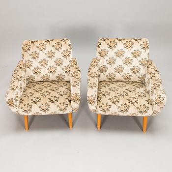 A pair of 1950s / 60s armchairs.