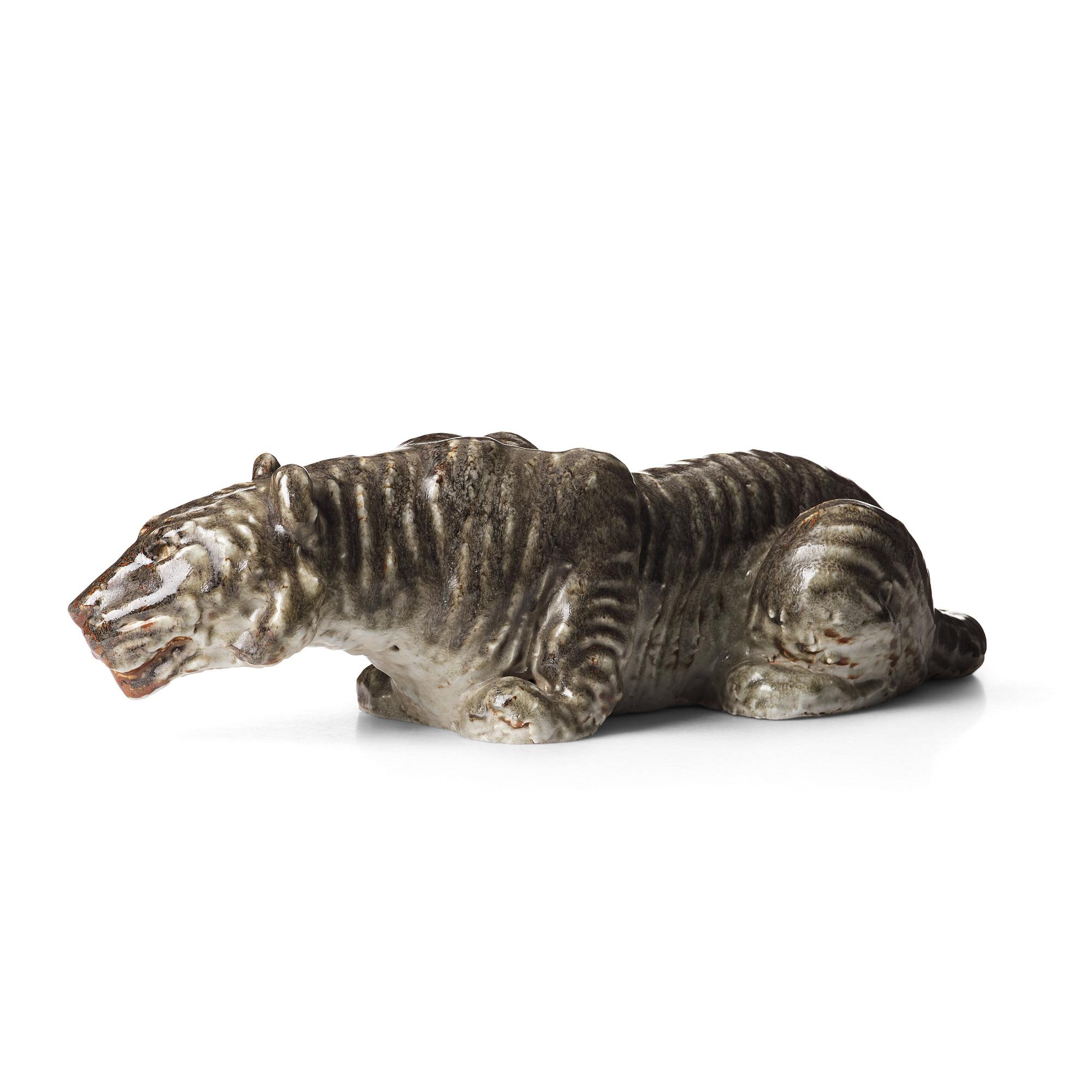 Michael Schilkin, a large stoneware sculpture of a hunting tiger, Arabia, Finland 1940's.