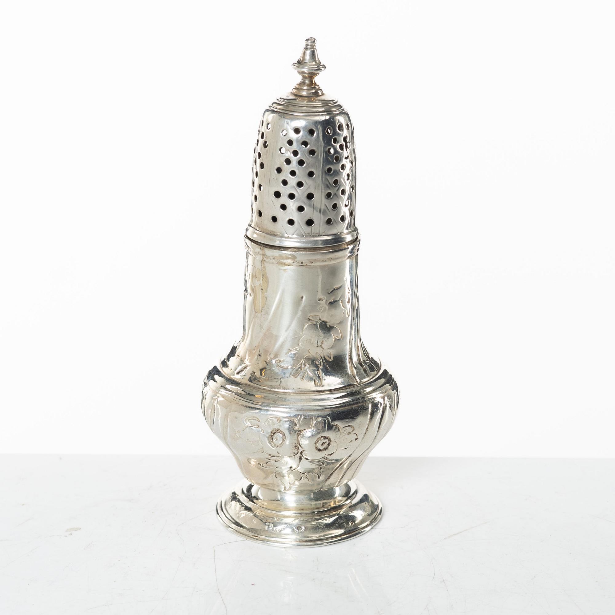 An English Rococo silver caster, mark of Samuel Smith III, London 1754.