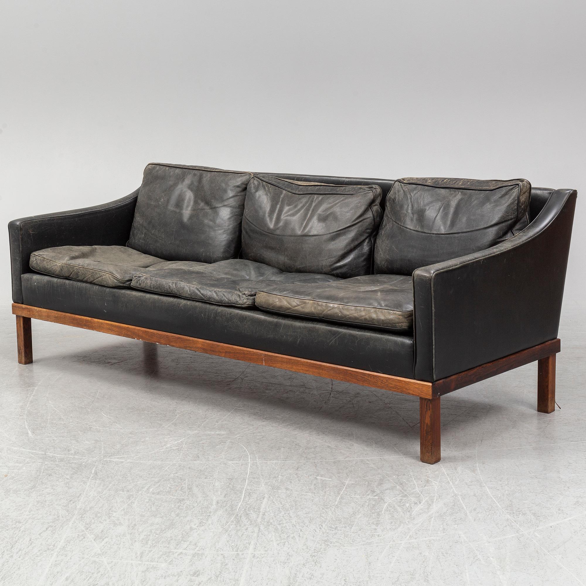 A black leather "The President" sofa by Ingemar Thillmark for OPE-möbler. Sweden.