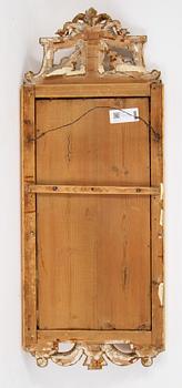A gustavian giltwood and parcel-gilt mirror by Johan Åkerblad (master 1758-1799).