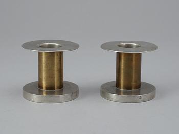 A pair of Bo Notini pewter and brass candlesticks, Svenskt Tenn 1932.