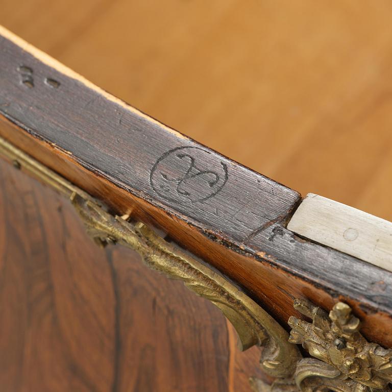 A rococo parquetry commode by C. G. Willkom (master in Stockholm 1763-65).