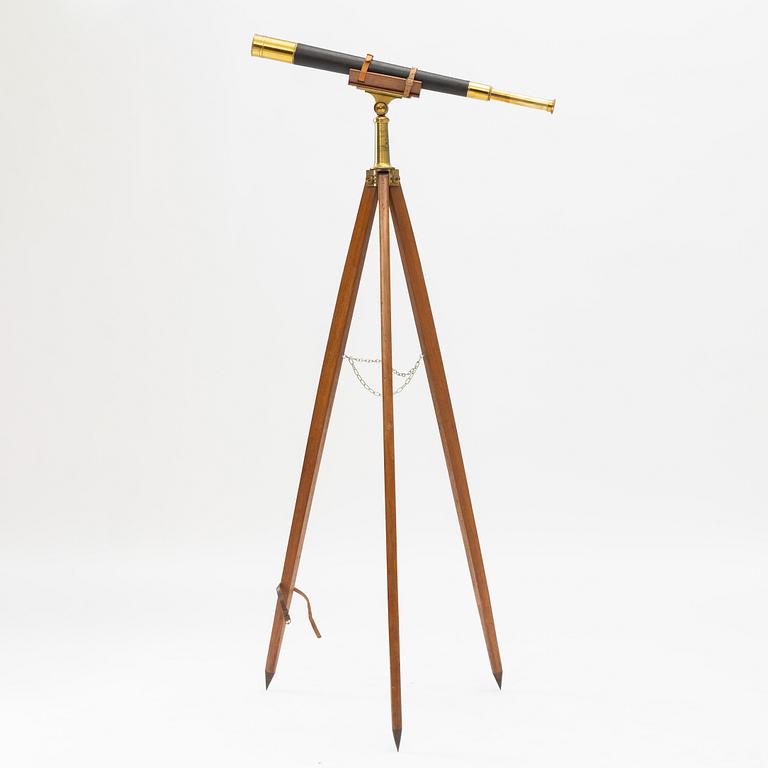 A 20th century telescope on a tripod.