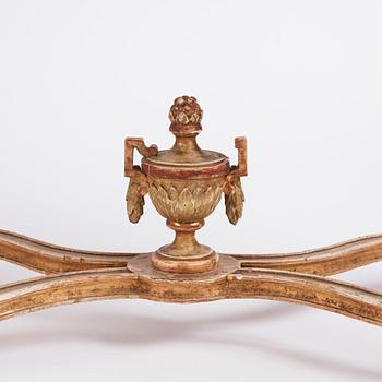 A Gustavian giltwood and faux-porphyry console table, late 18th century.