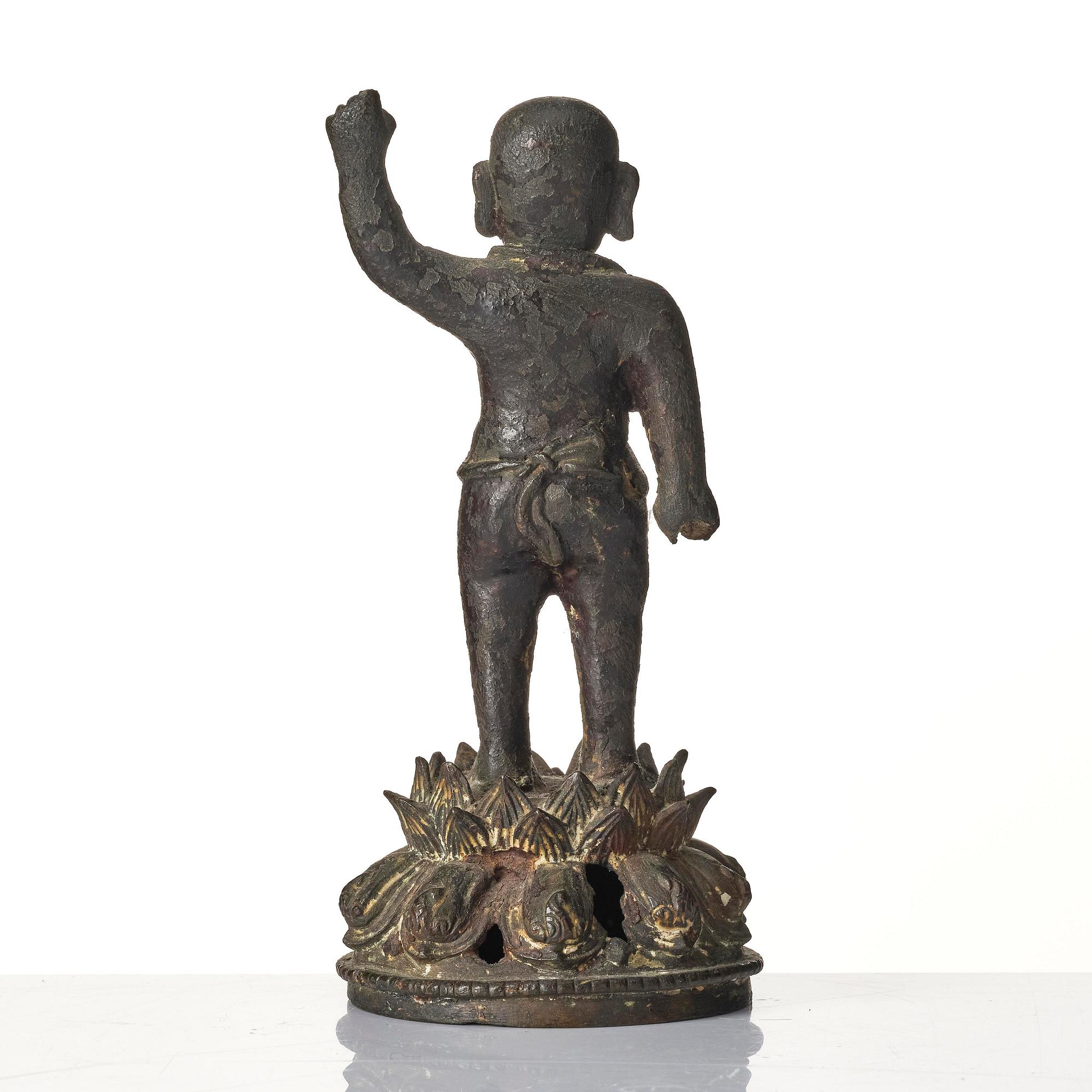 A bronze sculpture of buddha as a child, Ming dynasty (1368-1644).