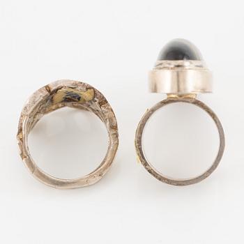 Lars Arby, fyra ringar, silver, en med tigeröga.