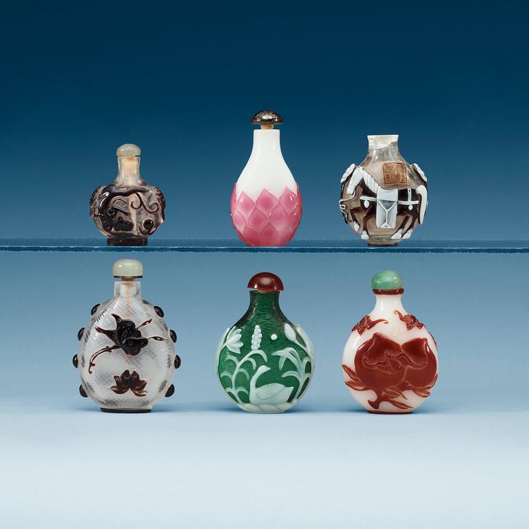 A set of six Chinese Peking glass snuff bottles.