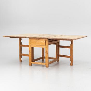 A 19th century gate-leg table.