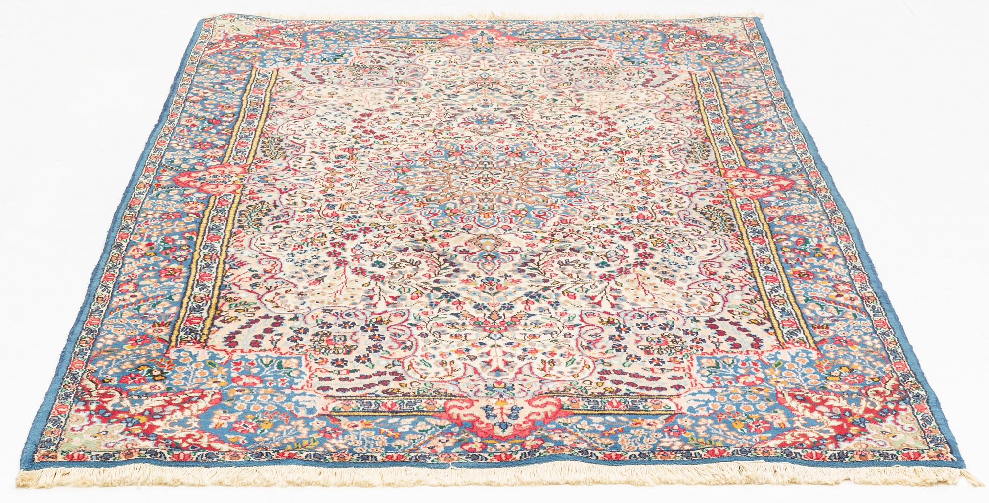 A rug, Kerman, ca 230 x 145 cm.
