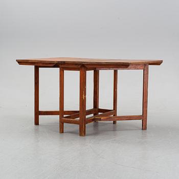 A pine gate leg table, 19th Century.