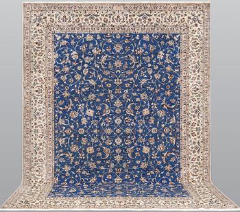 A Nain carpet, part silk, so called 4 LAA,  
c. 367 x 260 cm.