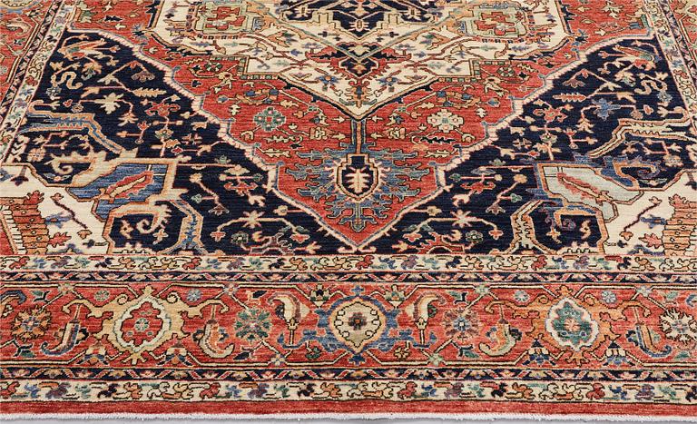 A Zigler, Heris Design carpet, 297 x 247 cm.