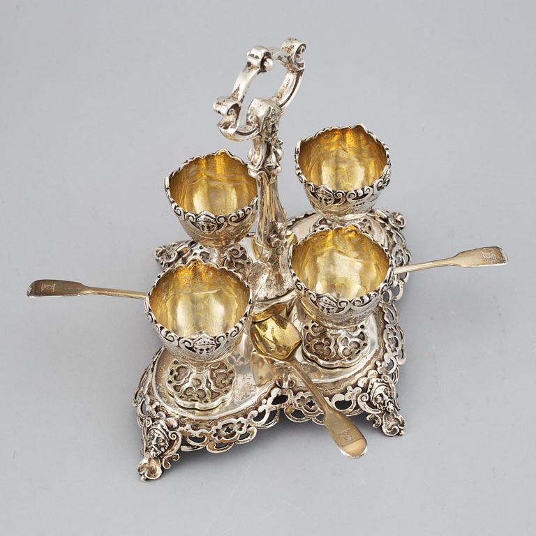 An English silver-gilt egg cruet set, mark of James Charles Edington, London 1857.
